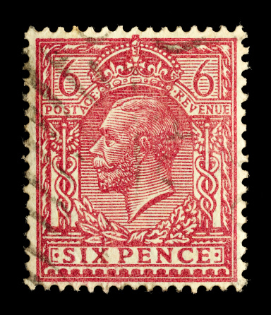 Exeter, United Kingdom - February 14, 2010: An English Used Six Pence Postage Stamp showing Portrait of King George V, printed and issued from 1912 to 1924