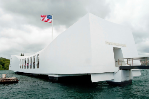 Honolulu, Hawaii -a September 21, 2011 -a  Tourists  on USS Arizona Memorial in Pearl Harbor in Honolulu, Hawaii. Resting place of 1,102 sailors killed during the attack on Pearl Harbor by Japanese.