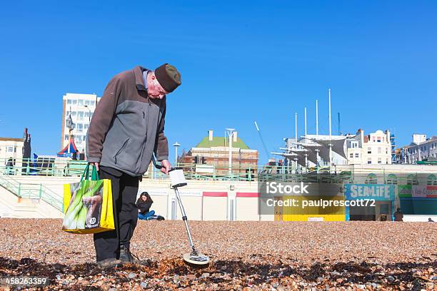 Old Man And Metal Detector Stock Photo - Download Image Now - Poverty, UK, Active Seniors