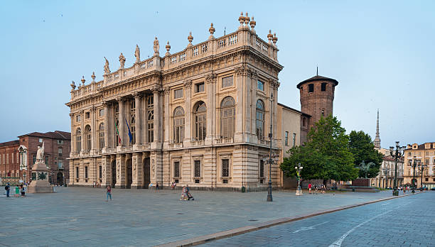 Turin, Italy - July 15, 2013: View from castle square of Palazzo Madama e Casaforte degli Acaja is a palace in Turin, northern Italy. It was the first Senate of the Italian Kingdom, and takes its traditional name from the embellishments it received under two queens (madama) of the House of Savoy.