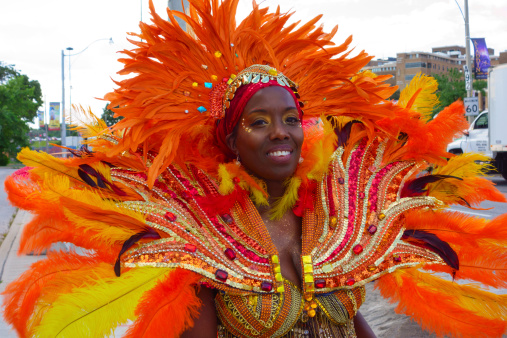 Punta Cana, Dominican Republic - February 03, 2024: Annual carnival in Punta Cana. The annual costumed procession of participants from different regions of the Dominican Republic. Each costumed group represents a separate region. Carnival is usually held in February in several cities of the Dominican Republic. In 2024, the carnival was held in the city of Punta Cana on February 03.
