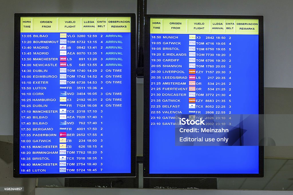 Arrecife international airport departures board Arrecuife, Spain - April 1, 2012: Arrecife international airport departures board in the new Terminal in Arrecife, Spain.The new terminal was build in 1999 and has a capacity of 6 Mio passenger per year. Air Vehicle Stock Photo