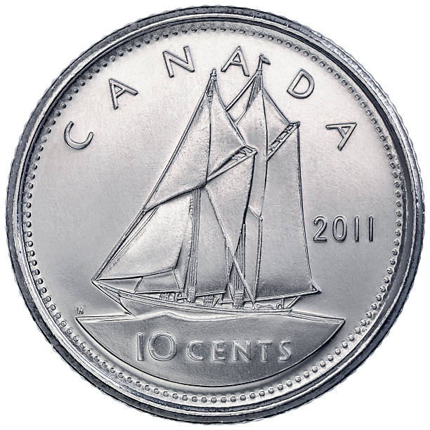 Reverse of the Canadian Ten Cents Coin Naucalpan, Mexico - March 14, 2013: Reverse of the Canadian Ten Cents Piece, it depicts a representation of the Bluenose, a famous Canadian schooner and was designed by Emmanuel Hahn canadian coin stock pictures, royalty-free photos & images
