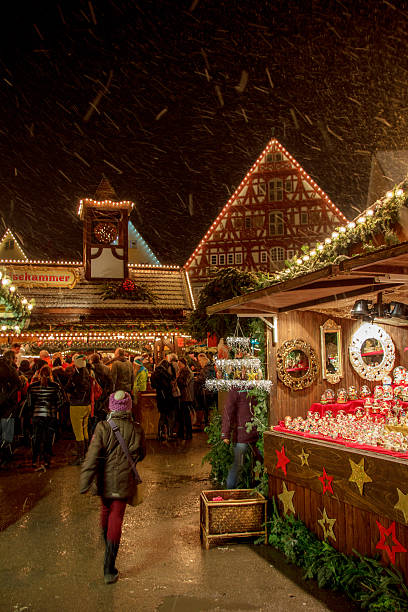 Visiting the medieval christmas market stock photo