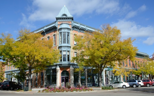 Fort Collins, Colorado, USA - October 15, 2013: Some of the quaint shops in downtown Fort Collins. Situated at the foot of the Rocky Mountains, Fort Collins is a college town with a thriving downtown and has been voted by Money magazine to be one of the best towns to live in.