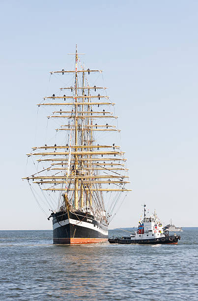 Krusenstern ship arrives to Tallinn Maritime Days Tallinn, Estonia - July 12, 2013:  Kruzenshtern or Krusenstern sail ship whit four tall masts arrives to Tallinn Maritime Days on July 12, 2013 in Tallinn, Estonia krusenstern stock pictures, royalty-free photos & images