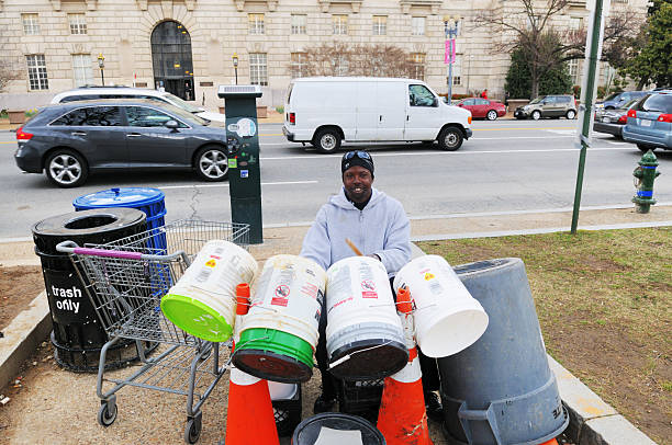 Washington, D.C., U.S.A. - March 26, 2013:  A Bucket Druming Street Performer on Constitution Avenue in Washington, D.C.