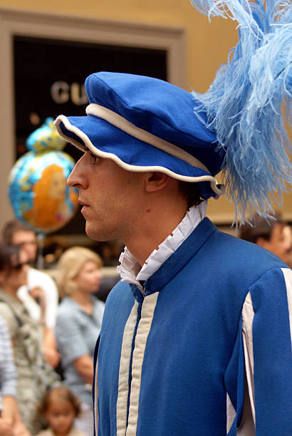 Florence, Tuscany, Italy - June 24, 2009: Man dressed in medieval clothes walks in the Historical Football Parade in Florence.