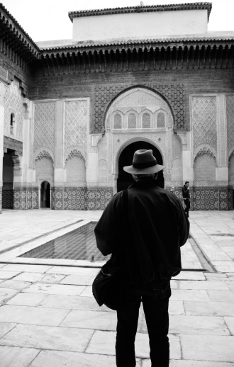 marrakech, Morocco- april 4, 2012; A tourist in Ali Ben Youssef Medersa in Marrakesh,Morocco