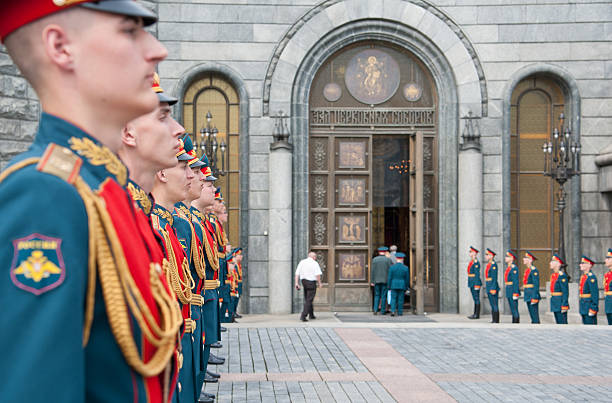 Russian soldiers at the Kremlin Wall and Eternal flame in Moscow