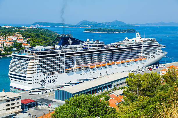 Dubrovnik, Croatia - July 26, 2013: A cruise ship MSC Divina moored at Cruise Port of Dubrovnik in Dubrovnik, Croatia on it's 7 nights East Mediterranean cruise. It is owned by MSC Cruises. It can host up to 3,959 passengers.