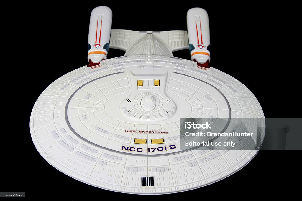 Plastic Frontier Vancouver, Canada - March 25, 2013: A toy replica of the USS Enterprise NCC-1701-D, the starship from Star Trek: The Next Generation, against a black background. Aspirations Stock Photo