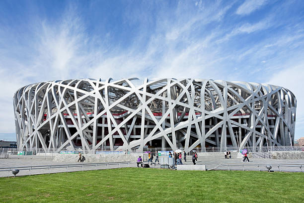 Bird's nest at day time, Beijing, China Beijing, China  September 17, 2011: Bird's nest at day time. The Bird's Nest is a stadium in Beijing, China. It was designed for use throughout the 2008 Olympics and Paralympics. beijing olympic stadium photos stock pictures, royalty-free photos & images