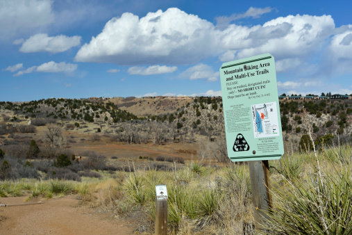 Colorado Springs, Colorado, USA - March 17, 2013: A trail map explains the rules in the beautiful Garden of the Gods, a park outside of Colorado Springs.