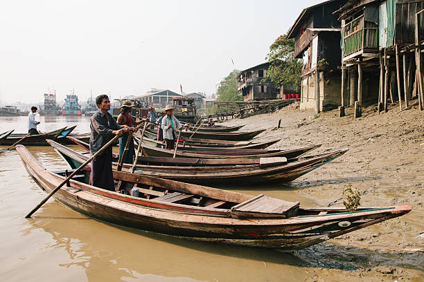 Burmese canoe drivers stock photo