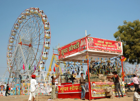 Pushkar,India - November 22,2012:People are having fun at amusement park during traditional camel mela in Pushkar,Rajasthan ,India.