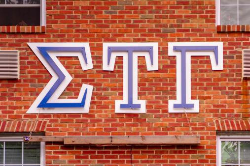 State College, USA - July 22, 2013: Sigma Tau Gamma Fraternity building with Greek letter sign in State College, Pennsylvania.