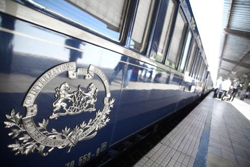 Bucharest, Romania - September 3, 2012: Detail on one of the wagons of the Orient Express train, shortly after arriving in Bucharest. The Venice Simplon-Orient-Express, is a private luxury train service, known as the Orient Express.