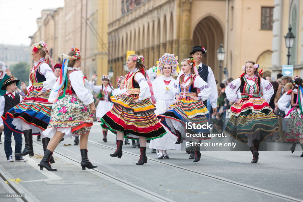 Oktoberfest - Traditional Costume and Riflemens parade through Munich Munich, Germany - September 22, 2013: The traditional costume and riflemens parade ("Trachten- und Schuetzenumzug") through Munich was held for the first time in 1835 to celebrate the silver wedding anniversary of King Ludwig I and Therese von Bayern. Since 1950 it was conducted each year and is one of the main Oktoberfest highlights which is broadcasted via TV into the whole world. Around 10.000 participants parade from Maximilian street through the inner city to the fairground. It is one of the best demonstrations of the very diverse traditional costumes and folk dances of Bavaria. In the last years it was also complemented by participants from other German states and other European countries. Oktoberfest Stock Photo