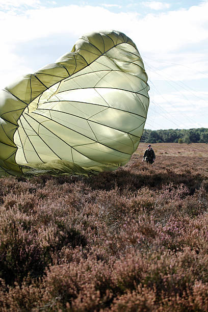 Borne Area, Ede Ede, Netherlands - September 22, 2012:Remembering of the world war ll Operation Market Garden the largest airborne landing operation ever was a failure that cost thousands of lives. More than 12,000 men, (Britiish, American and Poles) were dropped near Ede, but only 2,200 made it back home. The depiciting parachutist is one of the thousand soldiers dropped during the Remembering at 22 september 2012. The remembering is a yearly event in Ede, Netherlands. operation market garden stock pictures, royalty-free photos & images