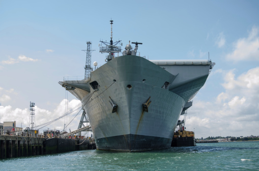 Portsmouth, England - August 2, 2013: Prow of the aircraft carrier HMS Illustrious docked in Portsmouth Harbour