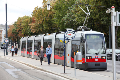 Vienna, Austria - September 9, 2011: Commuters ride a tram on September 7, 2011 in Vienna. With 172km total length, Vienna Tram network is among largest in the world. In 2009 186.9m passengers used Vienna trams.