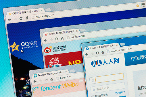 Izmir, Turkey - August 29, 2013: Chinese social media websites Qzone, Sina Weibo, Tencent Weibo and Renren on computer screen.
