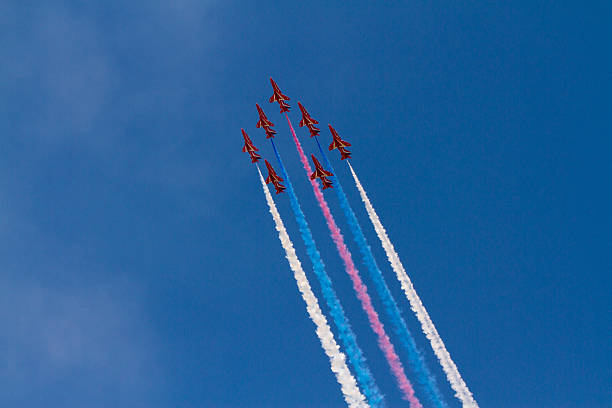 Red Arrows Display Team Weston-super-Mare, Somerset, England-July 23, 2012: The Red Arrows RAF Display team appearing at the Grand Pier Airshow stunt airplane airshow air vehicle stock pictures, royalty-free photos & images