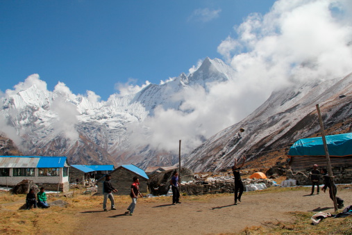 Deurali-Nepal. Taken on October 13, 2012. Sherpas playing volleyball at Annapurna Base Camp at the elevation of 13,435 feet.