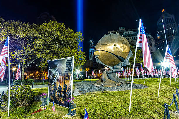 September 11th Memorial Site New York City, USA - September 11th, 2012: 911 memorial site with FDNY 911 Memorial Painting by Tom Lambui. new york city skyline new york state night stock pictures, royalty-free photos & images