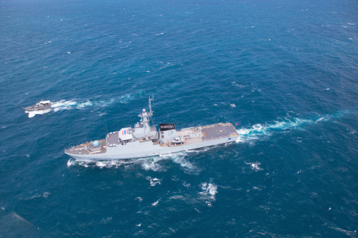 Chonburi, Thailand - June 21, 2013: His Thai Majesty Ship Krabi, an offshore patrol vessel of the Royal Thai Navy test control system and speed test.