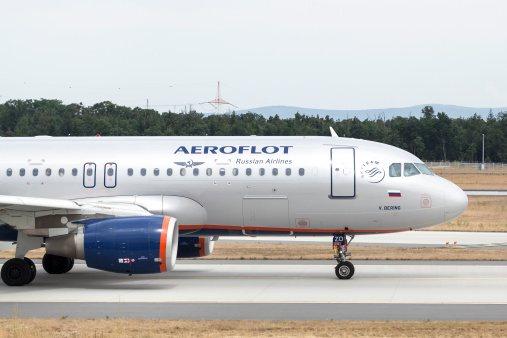 Frankfurt, Germany - July 23, 2013: An Airbus A320 of russian airline Aeroflot taxiing on the runway of Frankfurt Airport. Frankfurt International Airport is the largest airport in Germany. Aeroflot is the flag carrier of Russia and the largest russian airline. Founded in 1923 it is headquartered in Moscow, Russia