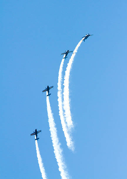 Blades Aerobatic Display team at Grand Pier Airshow Weston-super-Mare, Somerset, England-July 23, 2012: The Blades Aerobatic Display team appearing at the Grand Pier Airshow stunt airplane airshow air vehicle stock pictures, royalty-free photos & images