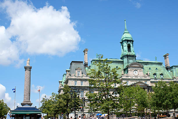 Glimpse of Old Montreal, Canada Montreal, Canada - July 26, 2008: Place Jacques Cartier (Jacques Cartier Square), Nelson Column and Montreal City Hall (HA'tel de Ville de MontrAal) with its copper roof. the City Hall was built in Second Empire Style between 1872 and 1878 in Old Montreal (Vieux Montreal) but was seriously damaged by the fire then reconstructed preserving the exterior walls. A lot of people in the square in front of the City Hall. place jacques cartier stock pictures, royalty-free photos & images