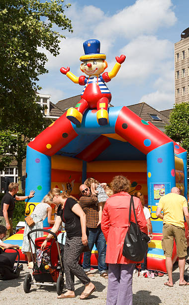 Children playing at the Swan Market Dordrecht, Netherlands - June 30, 2013: Parents with children playing at the Swan Market in Dordrecht. The lifestyle market was originally started in vacant shops in the Zaagmolenstraat, Rotterdam in the winter of 2010 and is known for its fun shopping and original products. dordrecht photos stock pictures, royalty-free photos & images