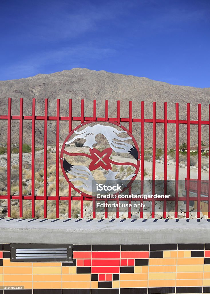 Belardo Memorial Bridge Tahquitz Creek Palm Springs Palm Springs,United States- March 17,2013: Image showing partial bridge,railing,tile and native Indian metal art. The bridge is dedicated to the memory of Richard M. Milanovich beloved and respected tribal and Civic leader of the Aqua Caliente Band of Cahuilla Indians Tribal Council. Dedicated in September of 2012. Art Stock Photo