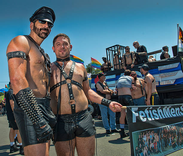 Fetish Men in the gay pride parade stock photo