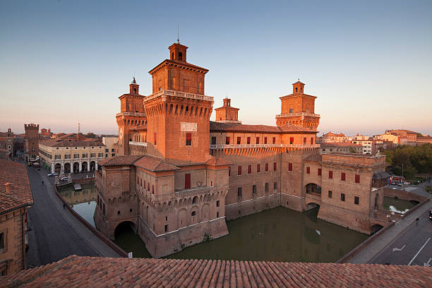 Estense Castle in Ferrara Ferrara, Italy - October 4, 2011: 7.21 A.M.The Estense Castle in Ferrara, view of the northen side, in foreground the Tower of the Lions circa 14th century photos stock pictures, royalty-free photos & images