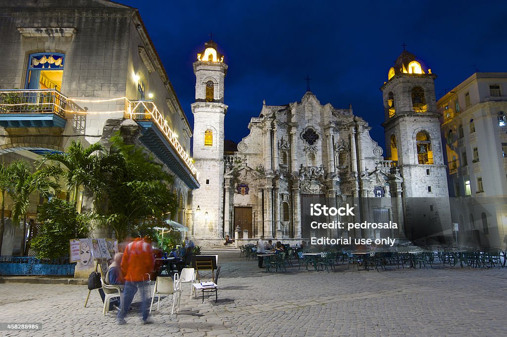 Havana Havana, Cuba  - January 30, 2007: tourists visit cathedral square, stands the Cathedral of San Cristobal. This is a typical place frequented by visiting tourists. Architecture Stock Photo