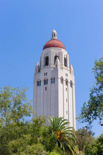Stanford, United States - July 6, 2013: Hoover Tower on the campus of  Stanford University. The tower houses the Hoover Institution of Library and Archives and is named after Herbert Hoover, the 31st President of the United States.