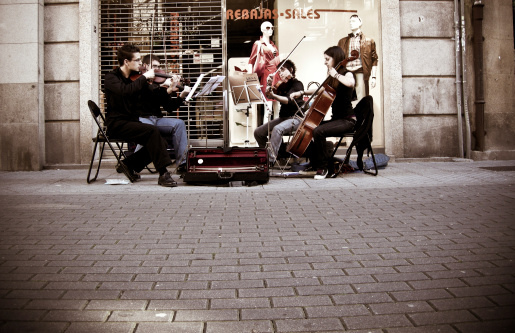 Pontevedra, Spain - July 25, 2007: A string quartet played in the street in the music days of the feast of St. James the Apostle, July 25, 2007 in Pontevedra, Spain.