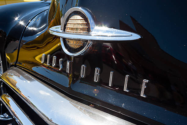Rocklin, USA - August 18, 2012: Vintage Oldsmobile Hood Emblem from a 1950's Oldsmobile Rocket 88 parked at a car show in Rocklin, CA.