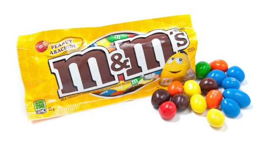 Toronto, Canada - May 10, 2012: This is a studio shot of M&M's milk chocolate candies made by Mars, Incorporated isolated on a white background.