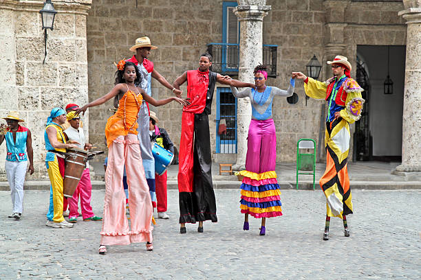Havana, Cuba - February 1, 2010: Street dancers in Havana. Cuba. With Cuba receiving over two million tourists a year,artists representing the cuban culture are part of the atmosphere of Havana