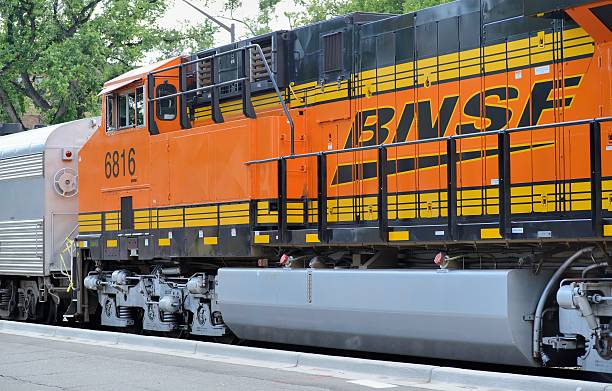 Fort Collins, Colorado, USA - August 24, 2013: A BNSF train in downtown Fort Collins. Burlington Northern Santa Fe is a major railway operator and part of Warren Buffett's Berkshire Hathaway.