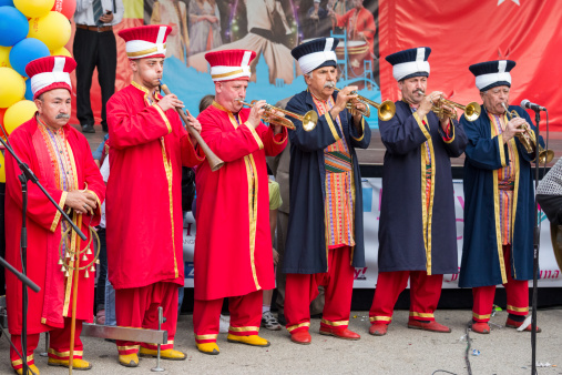 Bucharest, Romania - May 17, 2013: Traditional Ottoman army band members perform at trumpets during the celebratory events Turkish Festival.
