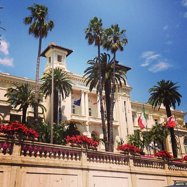CaptionSan Remo, Italy aa July 8, 2013: The Municipal Casino, built in 1905, is an example of liberty style building.