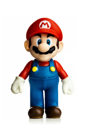 Miami, Florida, USA - July 7, 2013: Shot of Super Mario, Character from Super Mario Bros, platform video game developed by Nintendo in 1985. The commercial success of Super Mario Bros. has caused it to be ported to almost every one of Nintendo's major gaming consoles.