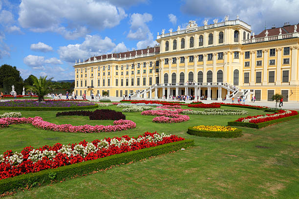 Vienna, Austria - September 6, 2011: Tourists visit Schoenbrunn Palace Gardens in Vienna. Palace and Gardens of Schonbrunn are a famous UNESCO World Heritage Site.