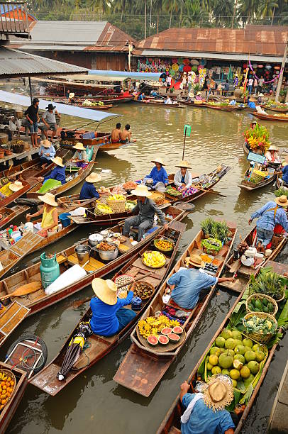 Tour boats on the canal at Khlong Lat Mayom floating market in Bangkok